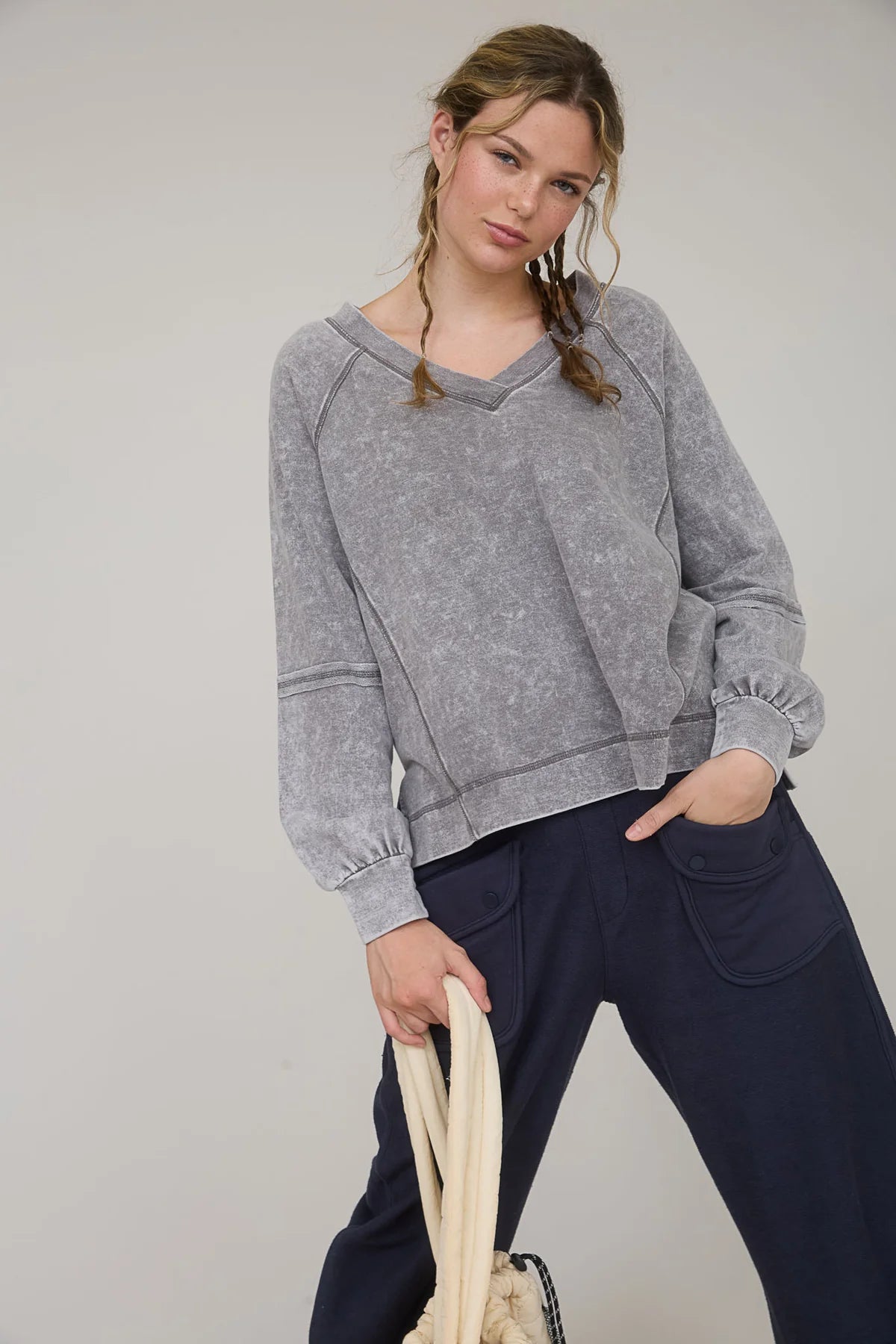 Washed V-Neck Exposed Seam Long Sleeve Knit Top